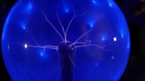 Boy Looking Through Plasma Ball2 Stock Footage 83066474