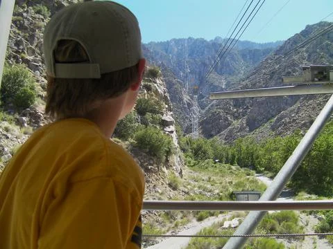 Boy Looking at Tram Stock Photos