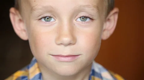 The boy looks at the camera Stock-Footage 64371727
