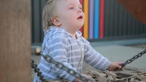 A boy looks at an educational toy Stock Footage 137541344