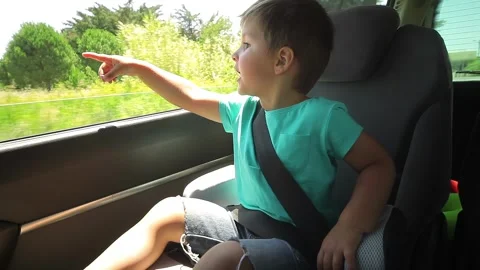 A boy looks with interest at the landscape Stock Footage 280795418