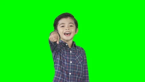 Boy looks mocking someone by laughing at camera Stock Footage 113471703