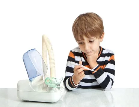 The boy looks at the thermometer. isolate on white background Stock Photos