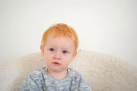 The boy looks up thoughtfully Stock Photos