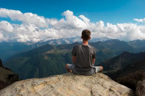 Boy lost in the mountains Stock Photos