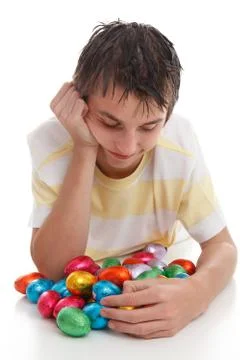 Boy with lots of easter eggs Stock Photos