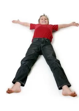 Boy lying down Stock Photos
