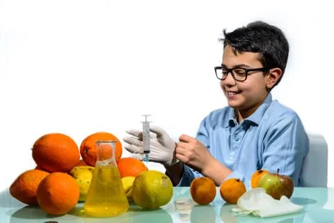 Boy Make the Experiments with Fruit. Stock Photos