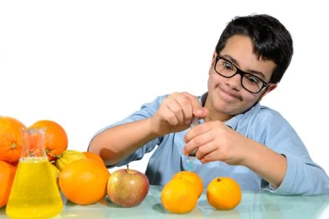 Boy Make the Experiments with Fruit. Stock Photos