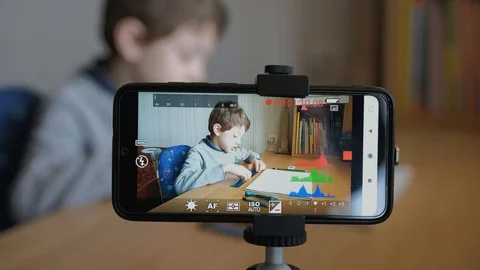 Boy make his first video blog how to draw an a car with drawing compass. Stock Footage 129012413