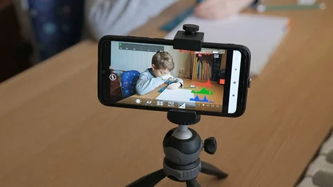 Boy make his first video blog how to draw an a car with drawing compass. Stock Footage 129012460