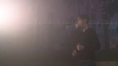 Boy make vape tricks Stock Footage 72030458