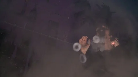 Boy make vape tricks. A lot of steam Stock Footage 72038316