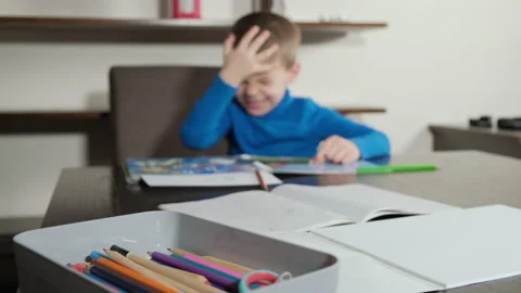 boy makes a mistake during homework. He ... | Stock Video | Pond5