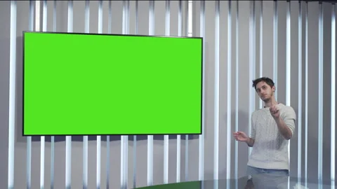 Boy makes no with his finger in front of a green screen Stock Footage 144246013