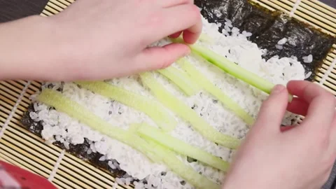 Boy makes sushi Stock Footage 232810378