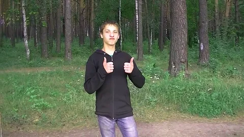 A boy makes two thumbs up Stock Footage 93992961