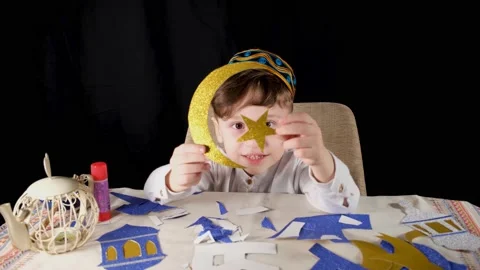 Boy making crescent and star Stock Footage 172566280