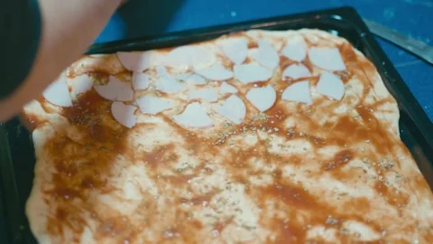 Boy is making a pizza Stock Footage 255886138