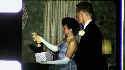 Boy Man GIVING CORSAGE Girl Teen Prom Co, Stock Video