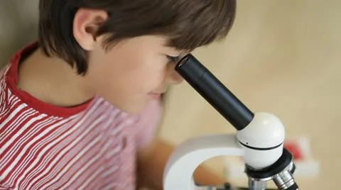 Boy with microscope Stock Footage 21307081