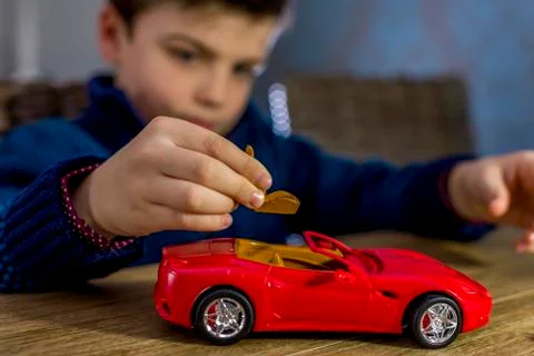 Boy with model car Stock Photos