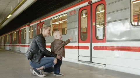 Boy Mom Goodbye Train - 4k Video stock 57950652