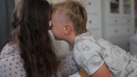 Boy mom playing in the room Stock Footage 130909737