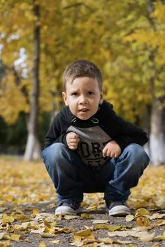 A boy in nature looking at the camera Stock Photos