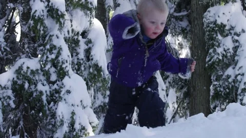 Boy Navigating Deep Snow - 4k - Slow motion Video stock 70150207