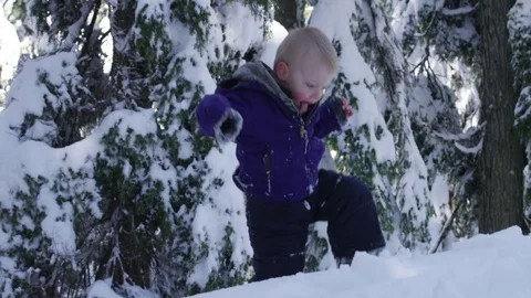 Boy Navigating Deep Snow Sit - 4k - Slow motion Video stock 70150020