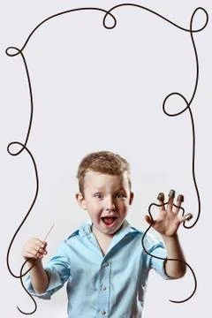 A boy with a needle and thread in a blue shirt on a light background Stockfoto's