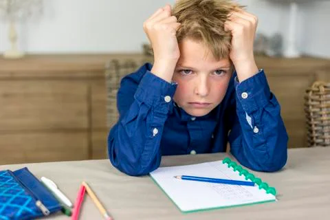 Boy needs help with his homework Stock Photos