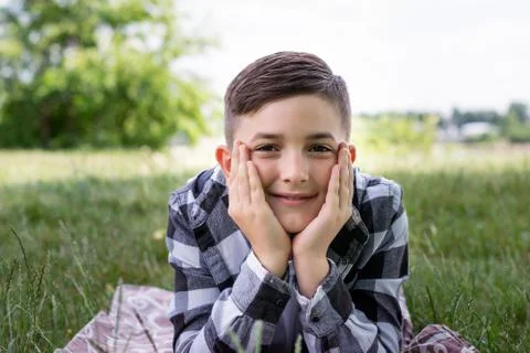Boy with nice smile having fun outside Stock Photos