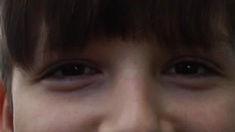 Boy nine years old looking at the camera. Slow motion Stock Footage 245911559