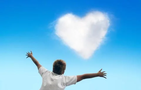 Boy with the open hands to the sky Stock Photos