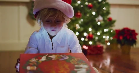 Boy Opening Christmas Present Stock Footage 83339061