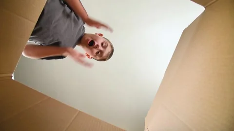 Boy Opening Up Surprise Gift Box Stock-Footage 276435800