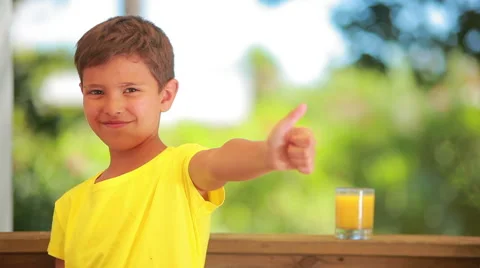 Boy like orange juice Stock Footage 67379747
