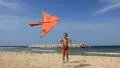 Boy with orange kite (editorial footage) HD Footage