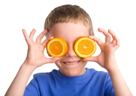 Boy with an orange Foto stock