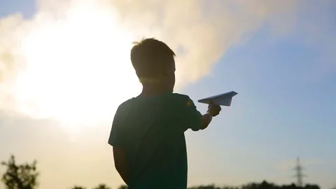 Boy With Origami Plane Stock Footage 77461772