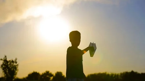 Boy With Origami Plane Stock Footage 78101670