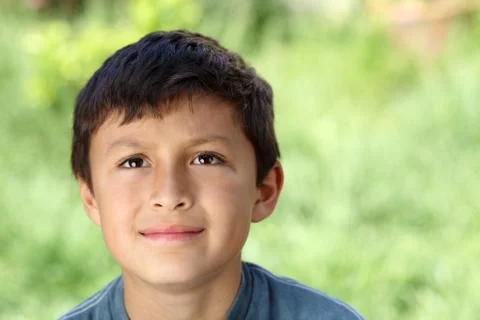 Boy outisde looking up Stock Photos