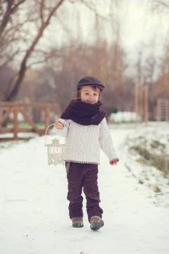 Boy outside in the snow Stock Photos