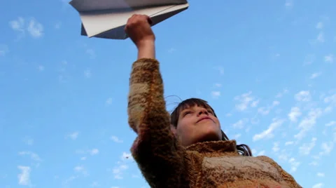 Boy with paper airplane(close-up) Stock Footage 32222518
