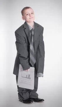 Boy with papers in hand Stock Photos