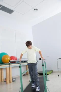 Boy in parallel bars 写真素材