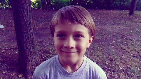 Boy in the park, close up video Stock Footage 114575580