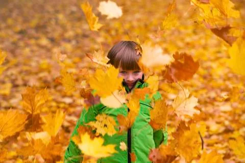 Boy in park in the fall 스톡 사진